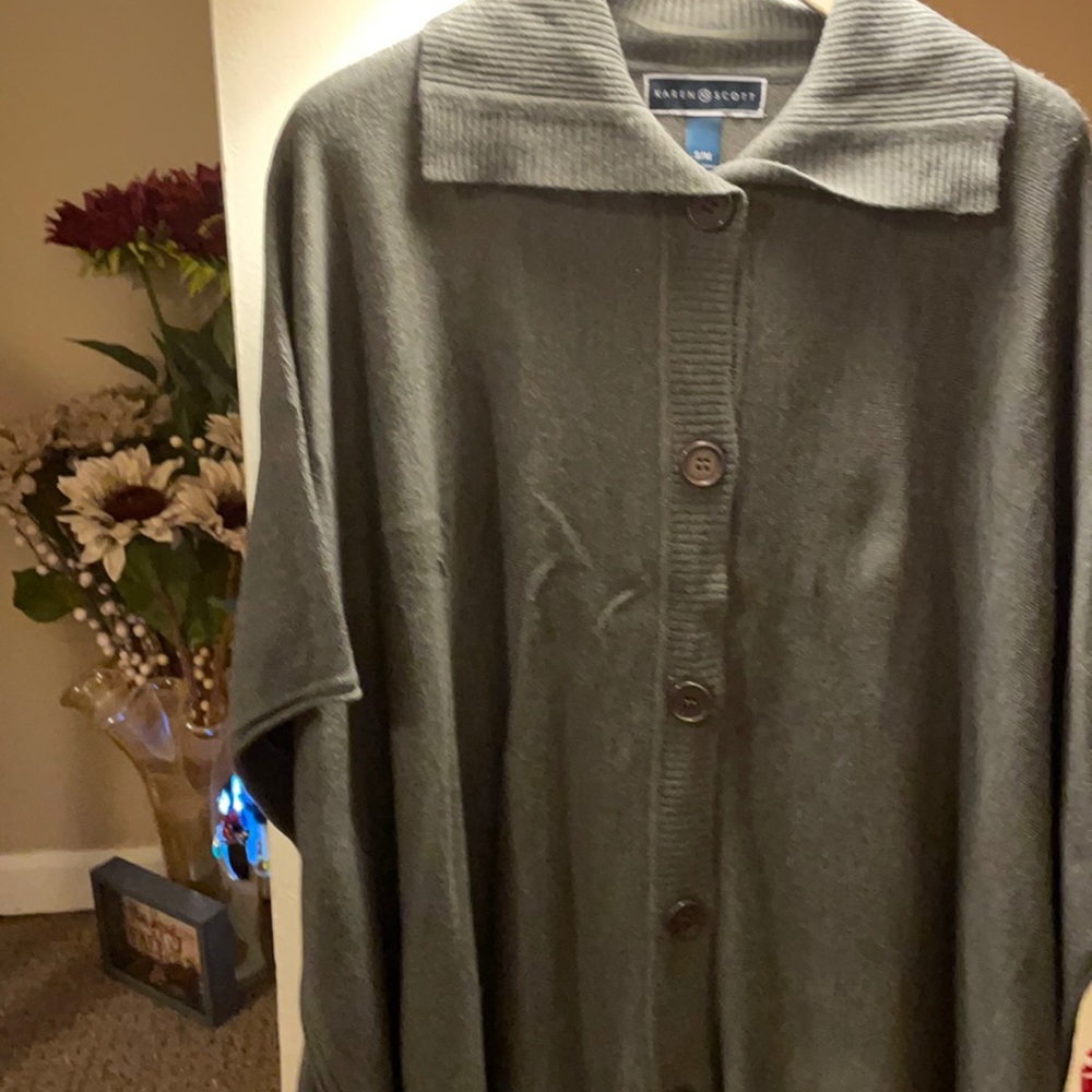 I have soft gray poncho it buttons up the front/ will look nice with jeans!!!